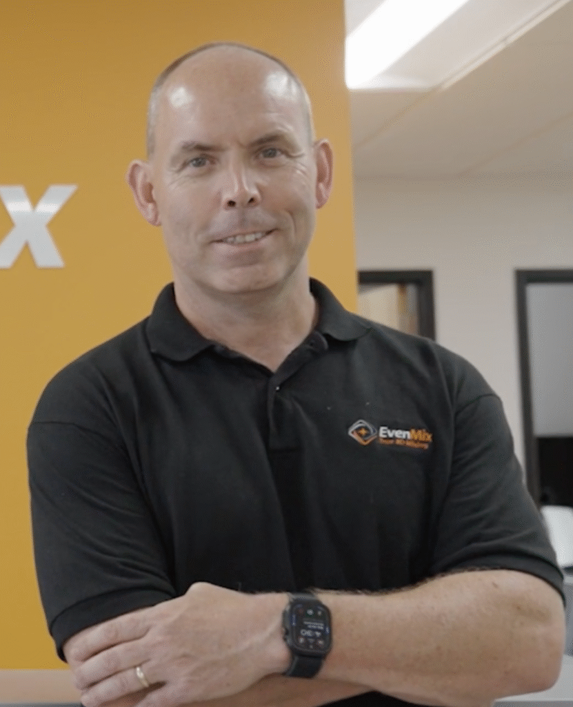 Phil Rankin, founder of EvenMix, standing in front of the EvenMix logo at the Ohio facility.